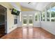 Bright sun room with lots of light, windows, and French doors that lead outside at 412 Beverly Dr, Summerville, SC 29485
