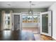Sunroom featuring natural light, wood floors, and backyard views at 412 Beverly Dr, Summerville, SC 29485