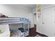 Bedroom featuring bunk beds with an eagles design and white doors leading into the hallway at 4419 Louisa Lane Ln, North Charleston, SC 29405