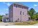 Three-story home featuring siding, a driveway and an attached garage at 4419 Louisa Lane Ln, North Charleston, SC 29405