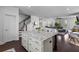 Open concept kitchen with large island flows into the living area, great for entertaining at 4419 Louisa Lane Ln, North Charleston, SC 29405