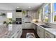 Modern kitchen featuring granite countertops, stainless steel appliances, and abundant natural light at 4419 Louisa Lane Ln, North Charleston, SC 29405