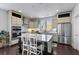 Stylish kitchen boasts an island, stainless steel appliances, and modern finishes at 4419 Louisa Lane Ln, North Charleston, SC 29405
