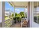 Charming outdoor seating area with plants, a delightful view of the neighborhood, and beautiful sunlight at 4419 Louisa Lane Ln, North Charleston, SC 29405