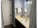 Standard bathroom featuring a neutral color scheme, a vanity with a sink, and a towel rack at 4470 Farmwood Ct, Ladson, SC 29456