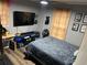 Cozy bedroom with modern amenities, a large-screen television, and a comfortable bed at 4470 Farmwood Ct, Ladson, SC 29456