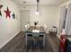 Cozy dining room featuring stylish decor and wood-look floors for easy maintenance at 4470 Farmwood Ct, Ladson, SC 29456