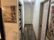 Hallway with vinyl floors and multiple doors at 4470 Farmwood Ct, Ladson, SC 29456