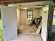 Inside a utility shed featuring concrete floors and a single window at 4470 Farmwood Ct, Ladson, SC 29456