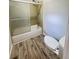 Full bathroom with a shower and bathtub combination and updated fixtures at 449 Estates Dr, Walterboro, SC 29488