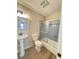 Bathroom features a pedestal sink and tub/shower combination at 449 Estates Dr, Walterboro, SC 29488