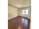 Spacious bedroom with a window and neutral walls at 449 Estates Dr, Walterboro, SC 29488