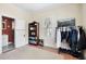 Bedroom with closet and adjoining bath, natural light and neutral colored walls at 4626 O'Hear Ave, North Charleston, SC 29405