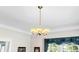 Close up of the dining room chandelier and trim work at 4626 O'Hear Ave, North Charleston, SC 29405