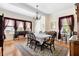 Spacious dining room with beautiful hardwood floors, natural light and elegant furnishings at 4626 O'Hear Ave, North Charleston, SC 29405