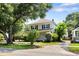 Two-story home with a classic design, showcasing mature trees and landscaping at 4626 O'Hear Ave, North Charleston, SC 29405