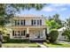 Charming two-story home with a welcoming front porch and well-maintained landscaping at 4626 O'Hear Ave, North Charleston, SC 29405