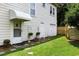 Well-maintained home featuring a side entrance, manicured lawn, and mature landscaping at 4626 O'Hear Ave, North Charleston, SC 29405
