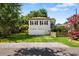 Detached garage with two bays and an apartment above, nestled in a lush, green yard at 4626 O'Hear Ave, North Charleston, SC 29405