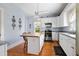 Bright kitchen features white cabinetry, butcher block island, and stainless steel appliances at 4626 O'Hear Ave, North Charleston, SC 29405
