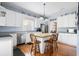 Charming kitchen with stainless steel appliances, custom island with barstool seating at 4626 O'Hear Ave, North Charleston, SC 29405