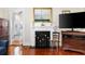 Cozy living room showcasing a fireplace and classic wood flooring at 4626 O'Hear Ave, North Charleston, SC 29405
