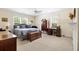 Bright main bedroom features plush carpet, ceiling fan and large windows at 4626 O'Hear Ave, North Charleston, SC 29405