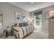 Comfortable bedroom features natural light and decor at 464 White Magnolia St, Moncks Corner, SC 29461