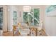 Bright dining area with glass table and four chairs at 4856 Green Dolphin Way # Share 8, Kiawah Island, SC 29455