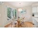 Bright dining area with a glass table and view to the outside at 4856 Green Dolphin Way # Share 8, Kiawah Island, SC 29455