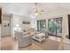Bright living room with a ceiling fan, comfortable seating, and sliding glass doors provides a relaxed and airy atmosphere at 4856 Green Dolphin Way # Share 8, Kiawah Island, SC 29455