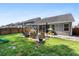 Large backyard with a patio seating area perfect for outdoor entertaining at 491 Foxbank Plantation Blvd, Moncks Corner, SC 29461