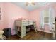 Cozy bedroom with a fun loft bed, hardwood floors, and a bright window creating a cheerful space at 491 Foxbank Plantation Blvd, Moncks Corner, SC 29461