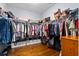 Spacious walk-in closet with ample hanging space and shelving, with hardwood flooring at 491 Foxbank Plantation Blvd, Moncks Corner, SC 29461