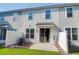 View of the home's backyard with a patio and well-maintained lawn at 4964 Hay Bale Ct, Summerville, SC 29485