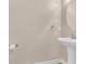 Bathroom with pedestal sink, large mirror, and neutral color palette at 4964 Hay Bale Ct, Summerville, SC 29485