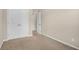 A spacious bedroom featuring neutral paint, carpet and a closet at 4964 Hay Bale Ct, Summerville, SC 29485