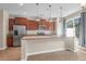 Well-equipped kitchen features granite countertops, stainless steel appliances, and ample counter space at 4964 Hay Bale Ct, Summerville, SC 29485