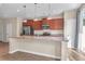 Bright open kitchen with granite counters, stainless appliances, and access to outdoor area at 4964 Hay Bale Ct, Summerville, SC 29485