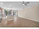Spacious living room featuring wood floors, neutral paint, and access to the backyard at 4964 Hay Bale Ct, Summerville, SC 29485