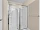 Shower with sleek glass doors, a built-in showerhead, and mounted bar at 4964 Hay Bale Ct, Summerville, SC 29485