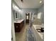 En-suite bathroom featuring double sinks, a glass-enclosed shower, a separate tub, and elegant fixtures at 5008 W W Liberty Meadows Dr, Summerville, SC 29485