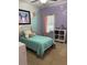 Bright bedroom featuring a whimsical color scheme, cozy bed, and ample natural light at 5008 W W Liberty Meadows Dr, Summerville, SC 29485