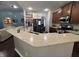 Well-equipped kitchen featuring stainless steel appliances, granite counters and bar seating at 5008 W W Liberty Meadows Dr, Summerville, SC 29485
