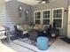 Outdoor patio area with comfortable seating and grill at 5008 W W Liberty Meadows Dr, Summerville, SC 29485