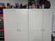 Garage storage with gray cabinets and various supplies on top at 5008 W W Liberty Meadows Dr, Summerville, SC 29485