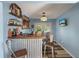 Unique bar area featuring a corrugated metal facade and a warm, inviting ambiance at 5052 Hidden Forest Ln, North Charleston, SC 29420