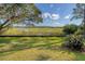 Scenic backyard view overlooking the marsh and the natural beauty of the surrounding landscape at 5084 Timber Race Crse, Hollywood, SC 29449