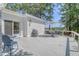 Outdoor deck area with furniture and views of the surrounding trees at 5084 Timber Race Crse, Hollywood, SC 29449
