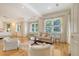 Spacious bedroom with sitting area, hardwood floors, and lots of natural light at 5084 Timber Race Crse, Hollywood, SC 29449